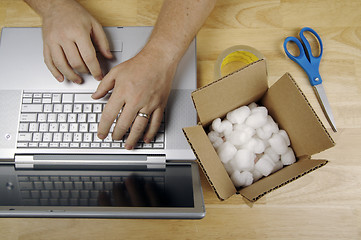 Image showing Businessman Works on Laptop 