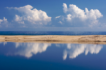 Image showing Tropical Shoreline with Clouds