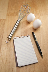 Image showing Mixer, Eggs, Pen and Pad of Paper