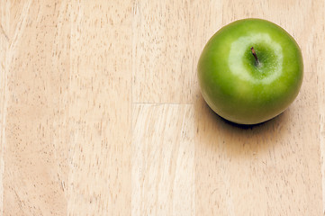 Image showing Apple Overhead on Wood