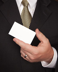 Image showing Businessman Holding Blank Business Card