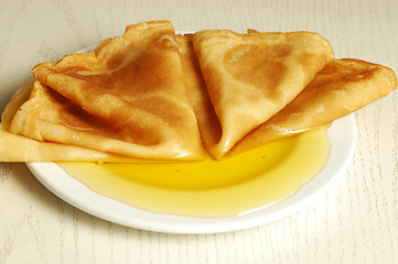 Image showing pancakes with honey