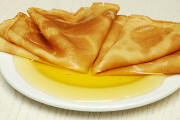 Image showing pancakes with honey