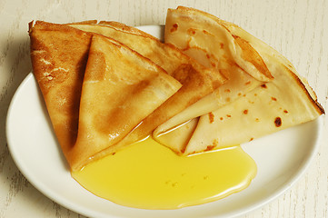 Image showing pancakes with honey