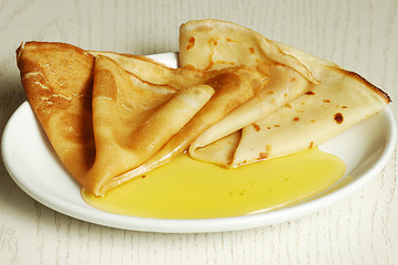 Image showing pancakes with honey