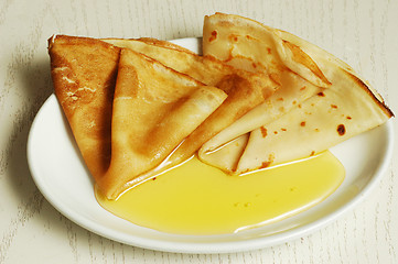 Image showing pancakes with honey