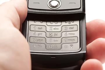 Image showing Man Holds Cell Phone