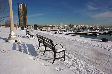 Image showing Empty Snowy Bench in Chicago