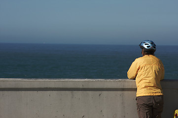 Image showing Bicyclist Rests Near Ocean