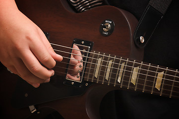 Image showing Musician Plays His Gibson