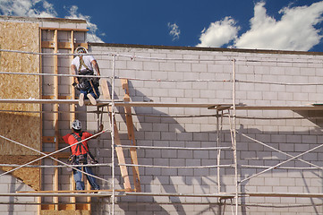 Image showing Carpenters Working Diligently