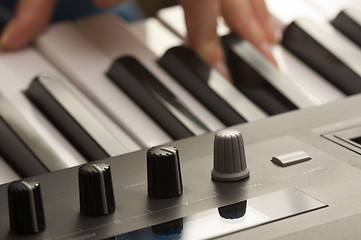 Image showing Woman's Fingers on Digital Piano Keys