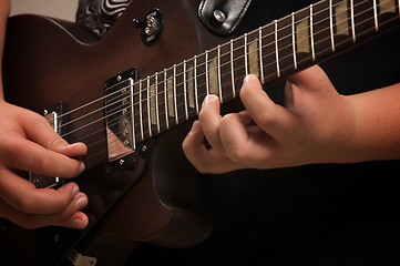 Image showing Musician Plays His Gibson