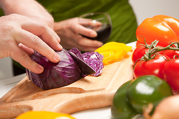 Image showing Man Slicing Vegetables