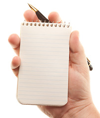 Image showing Male Hands Holding Pen and Pad of Paper