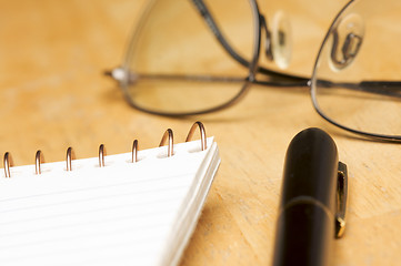 Image showing Pen, Pad and Glasses Abstract