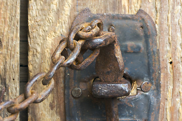 Image showing Rusty Barn Door Latch and Chain