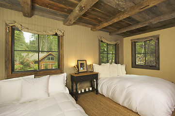 Image showing Luxurious Rustic Log Cabin Bedroom