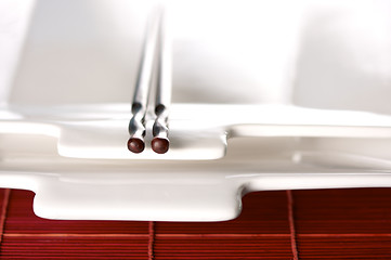 Image showing Wooden Chopsticks & White Plate