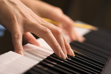 Image showing Woman's Fingers on Digital Piano Keys