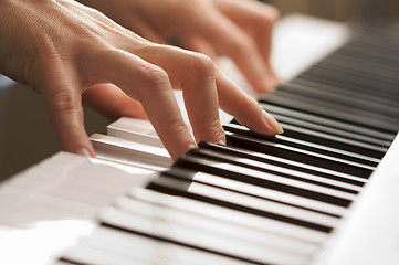 Image showing Woman's Fingers on Digital Piano Keys