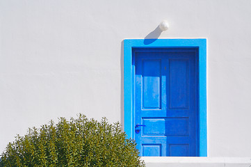 Image showing Abstract close-up of Santorini home wall, door and lamp.