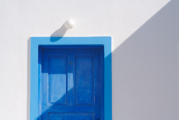 Image showing Abstract close-up of Santorini home wall, door and lamp.