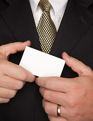 Image showing Businessman Holding Blank Business Card