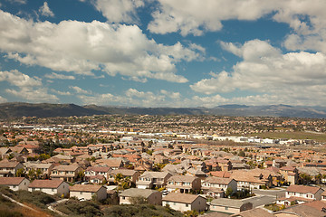 Image showing Contemporary Neighborhood and Majestic Clouds