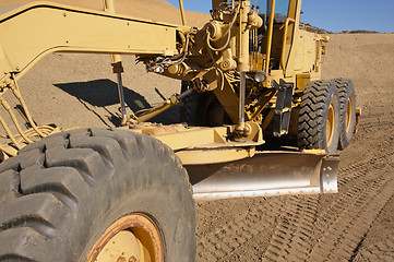 Image showing Tractor at a Construction Site and dirt lot.