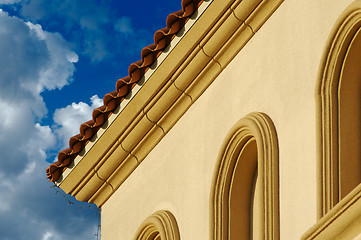 Image showing Stucco Wall Construction & Arched Windows