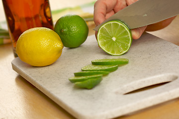 Image showing Slicing a Lime