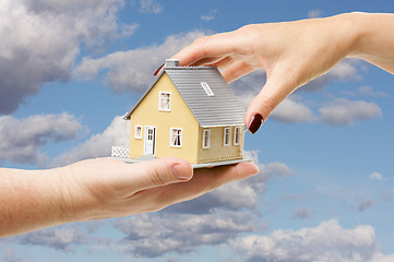 Image showing Reaching For A Home