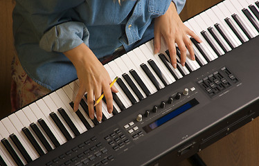 Image showing Woman's Fingers on Digital Piano Keys