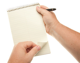 Image showing Male Hands Holding Pen and Pad of Paper