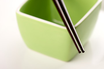 Image showing Chopsticks & Green Bowl