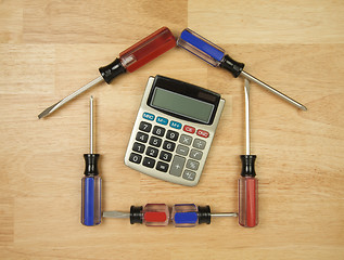 Image showing House Shaped by Screwdrivers and Calculator