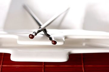 Image showing Wooden Chopsticks & White Plate