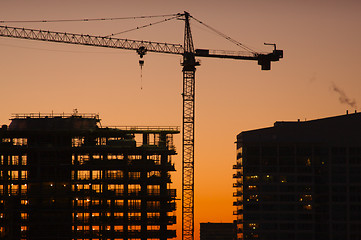 Image showing Silhouette of Crane and Building