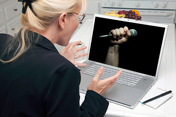 Image showing Excited Woman In Kitchen Using Laptop - Freedom of Speech