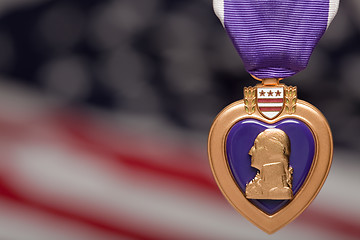 Image showing Purple Heart Against American Flag