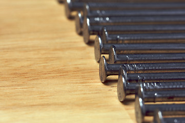 Image showing Macro of Nails on Wood