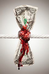 Image showing Wrinkled American Dollar Bleeding in Rope