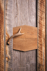 Image showing Rustic Cabinet with Antler Handle