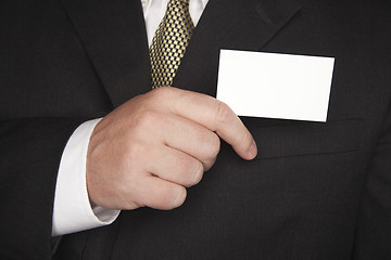 Image showing Businessman Holding Blank Business Card