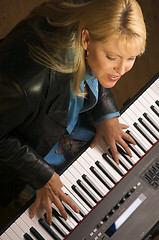 Image showing Female Musician Performs