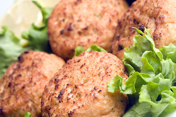 Image showing lobster cakes with lemon wedges tartar sauce