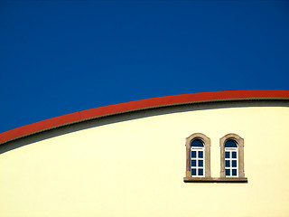 Image showing Yellow house and blue sky