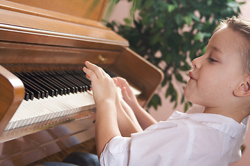 Image showing Children Playing the Piano