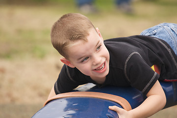 Image showing Adorable Child Playing at the Playground